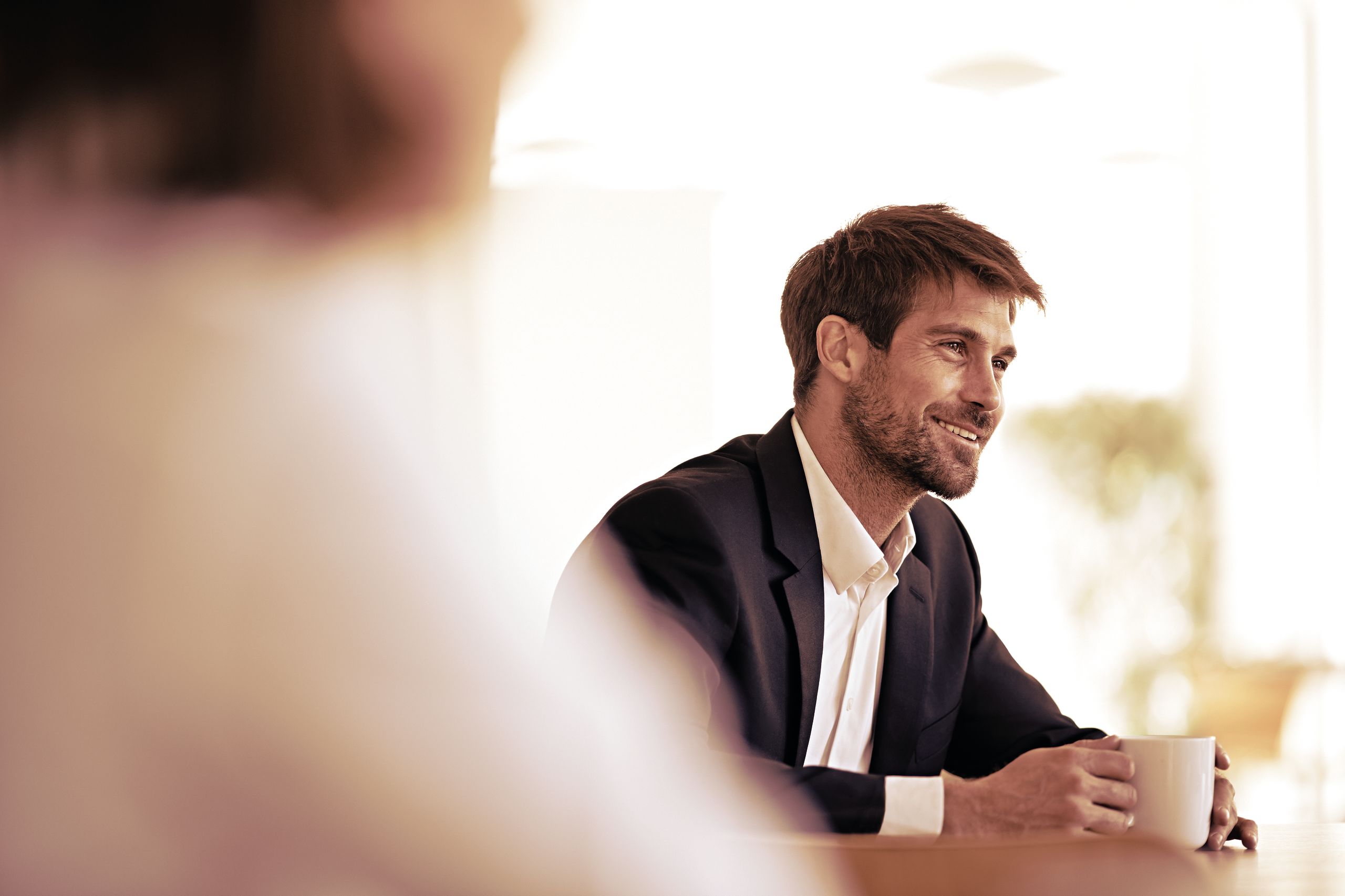 A man in a meeting room