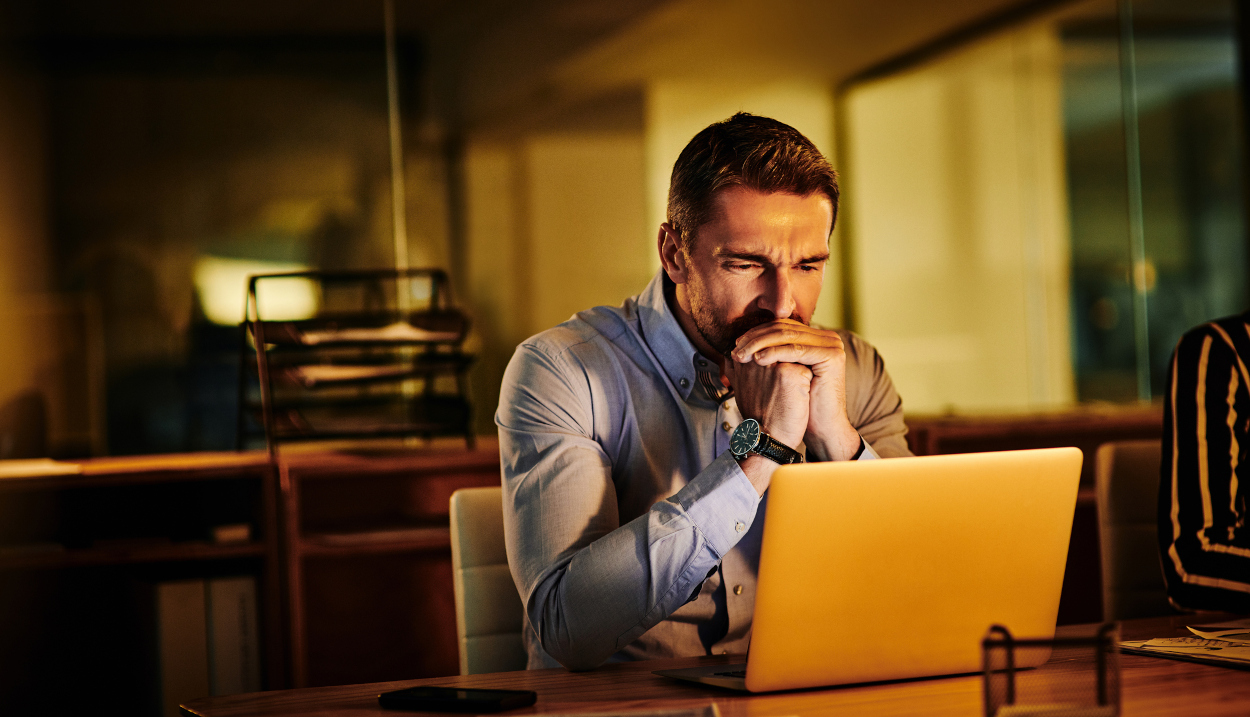 A man in front of his computer