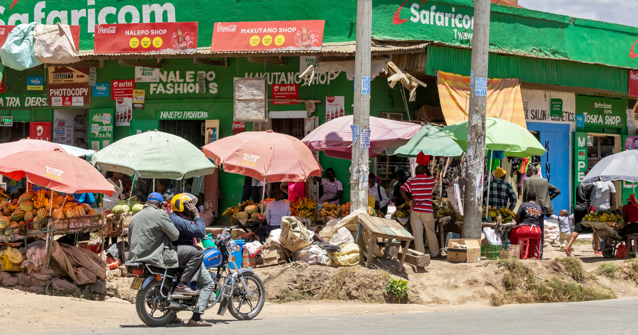 A street with a supermarket in Kenya